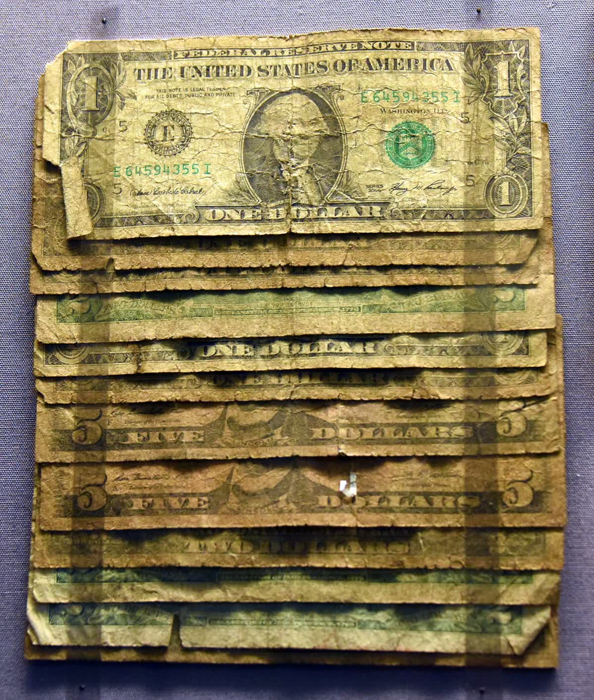 US one-dollar banknotes, collected in Zimbabwe in 2015. Used as local currency. On display at the British Museum in London — 원달러 환율 원화 약세 — 달러가 아니라 원화 수급이 원인